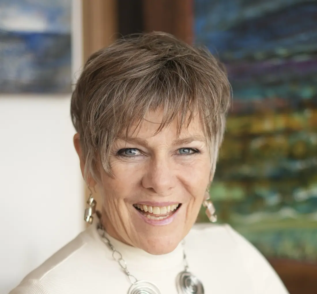 Portrait of Gayle Barklie smiling in her studio